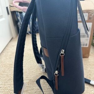 Navy and brown samsonite backpack!
